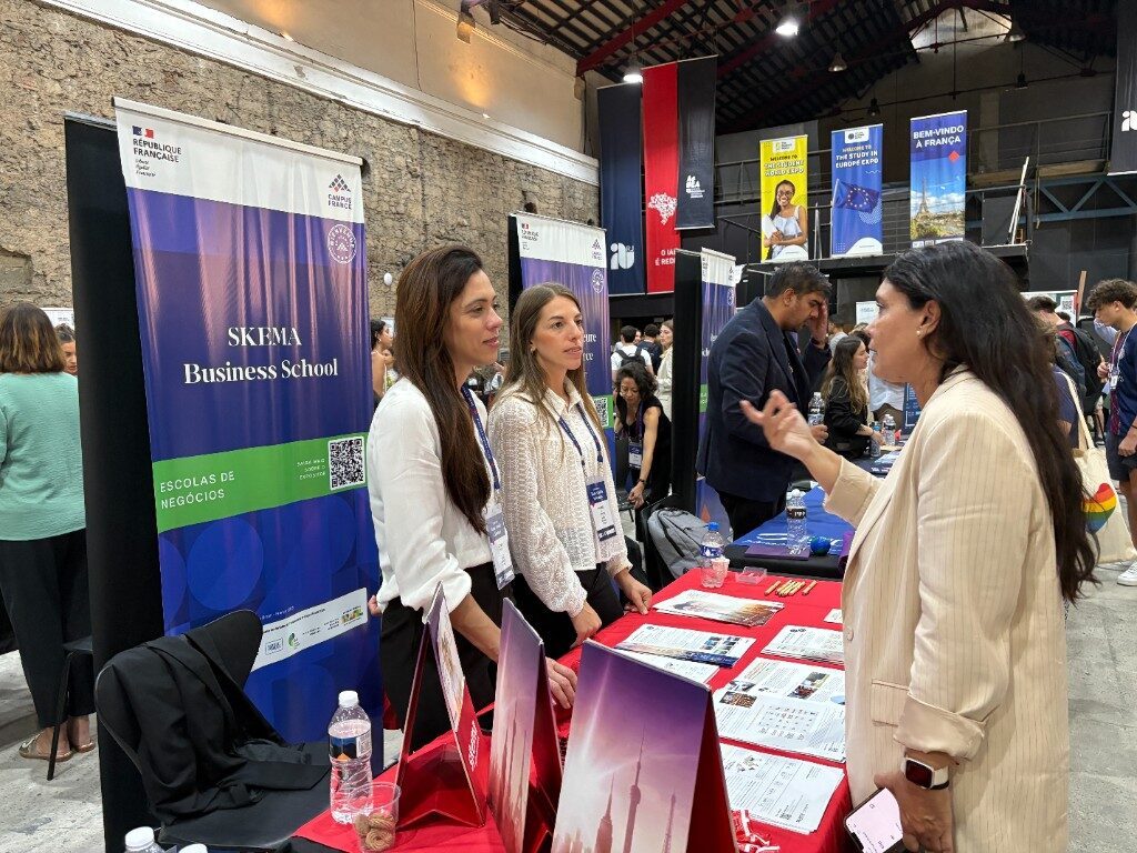 SKEMA Business School booth in conversation with prospective Brazilian students